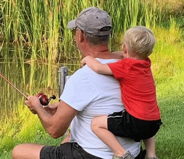 Man and child fishing