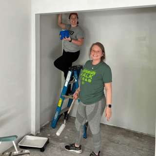 Bankers painting new home for Good Works, Inc. 