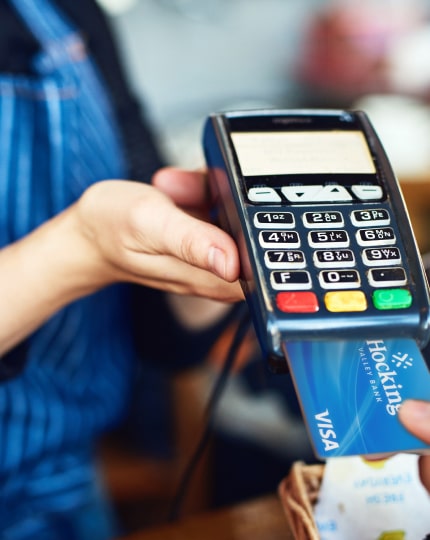 customer using debit card with merchant
