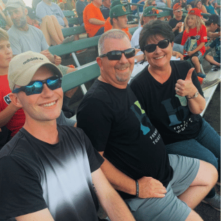 Banker and her family attending a Southern Ohio Copperheads game.