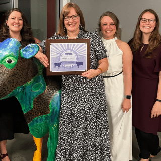 Hocking Valley Bankers accepting a Holy Cow Award at the Dairy Barn Arts Center