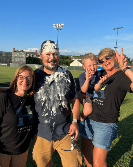 Fan with pie on his face at a Southern Ohio Copperhead game
