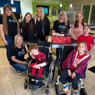 Albany office employees with Alexander Inclusive Playground Project representatives